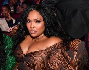 Lizzo Fights Her 'Darker Days' With 'Self-Love'