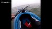 Heartwarming moment American kayaker rescues seal trapped in fishing line in Namibia