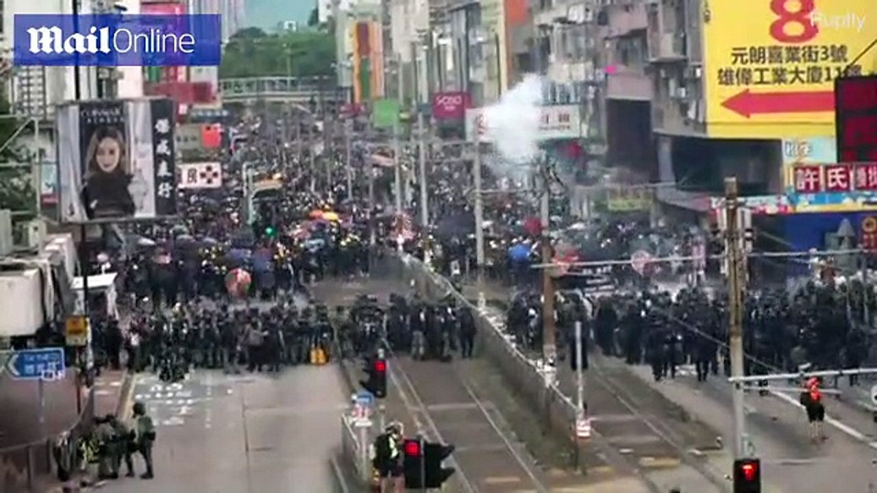 Thousands of protesters met with riot police and teargas in Hong Kong
