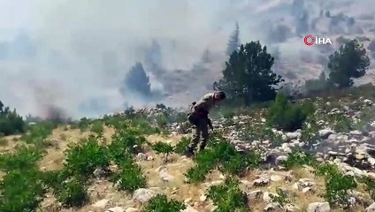 Tải video: Kahramanmaraş'ta dağlık alanda çıkan yangın söndürüldü