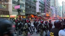 Hong Kong police move to forcefully clear protesters, using tear gas