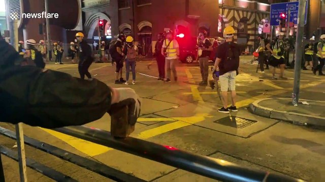 Injuries and arrests as police attempt to clear protesters from Hong Kong's streets
