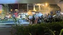 Tear gas: Hong Kong police and protesters clash