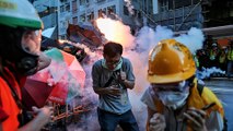 Hong Kong protesters target Beijing's office, clash with police