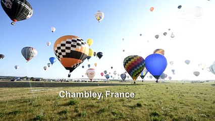 More than 400 hot-air balloons fly over northeastern France