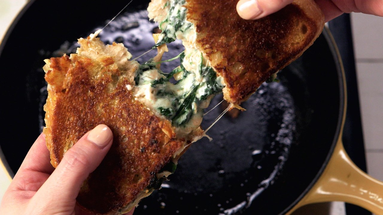 This Grilled Cheese Is Loaded With Spinach & Artichoke Dip