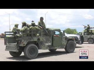 Télécharger la video: Pobladores se enfrentan a Guardia Nacional por líder huachicolero | Noticias con Ciro Gómez Leyva