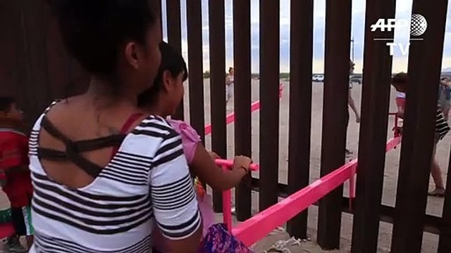 Protest seesaw links kids on both sides of US-Mexico border