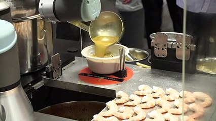 Sophie the robot whips up oodles of Singapore noodles