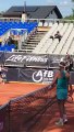 Tennis - Girlfriends Alison Van Uytvanck and Greet Minnen embrace and share a kiss at the net