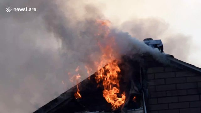 Incredible moment brave firefighters battle flames in Pennsylvania that claimed one woman's life