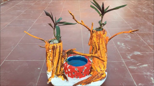 Great Combination of Fabric and Cement - Garden Decoration Ideas with Plant Pots Combining Fish Tank