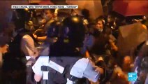 Hong Kong: Over 20 protesters charged with rioting appear in court