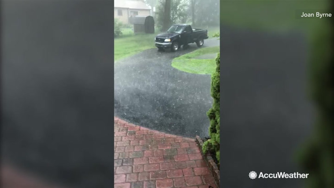 Trying to keep dry in this downpour is impossible