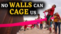 See-saw installed at US-Mexico border wall lets children play