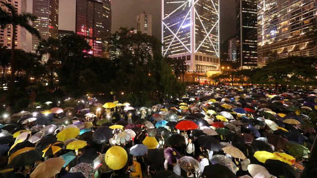 Bankers stage flash mob protest against Hong Kong government’s handling of extradition bill crisis