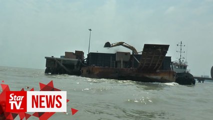 Ship captain and engineer held for dumping coal dust at sea