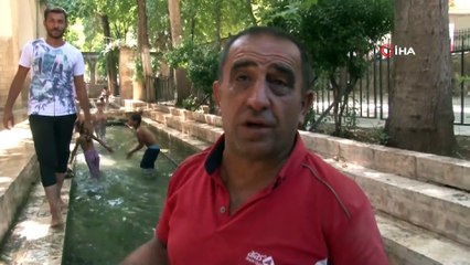 Şanlıurfa’da sıcaklık etkisini sürdürüyor, vatandaşlar serinlemek için her yolu deniyor