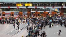 Protesters block Hong Kong cross-harbour tunnel, as anti-government march is held in Mong Kok