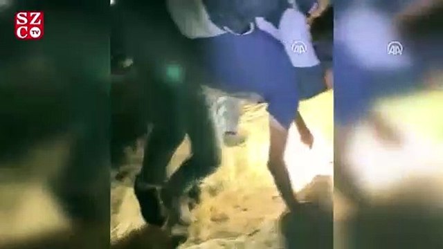 Polis kurtardığı yaralıyı ambulansa kadar sırtında taşıdı