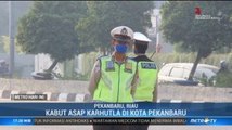 Pekanbaru Diselimuti Kabut Asap, Jarak Pandang Hanya 1 Km