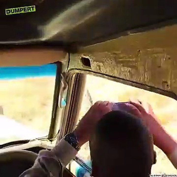 Leopard wants a closer view of safari riders