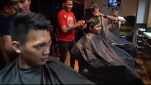 Business is good for Scottie Thompson's barber shop