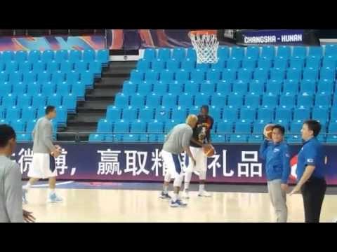 Coach Alex Compton helping out during warmups before Gilas game vs India