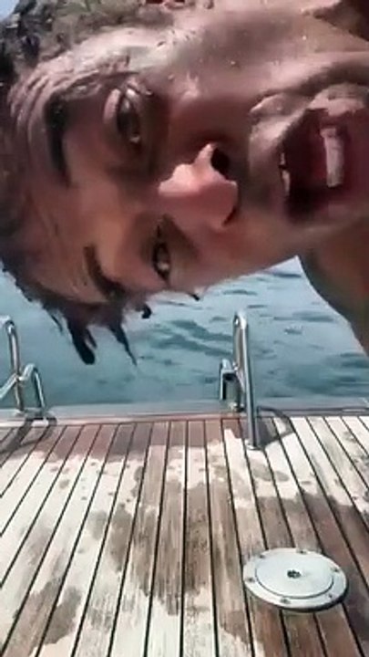 Yannick Noah went for a swim and caught a fish with his hands