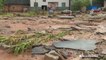 13 dead as flooding causes multiple homes to collapse