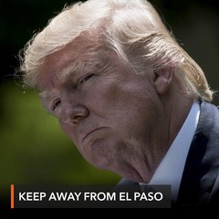 Trump faces hostility on visits to massacre sites