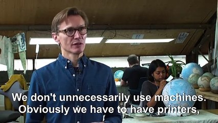 In a London workshop, artisans craft bespoke globes