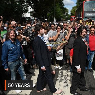 Beatles fans come together for 50th anniversary of Abbey Road photo