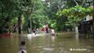 Towns turned to lakes as flooding displaces tens of thousands of people