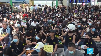 Hundreds stage sit-in protest at Hong Kong's international airport