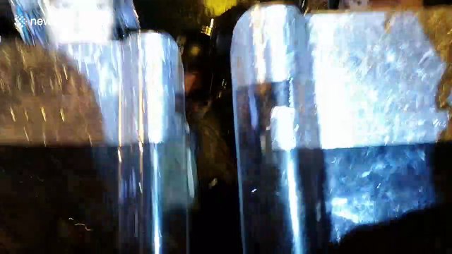 Riot police use pepper spray against protesters in Hong Kong