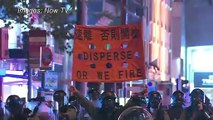 Hong Kong shopping district shrouded in tear gas in 'hit-and-run' demos