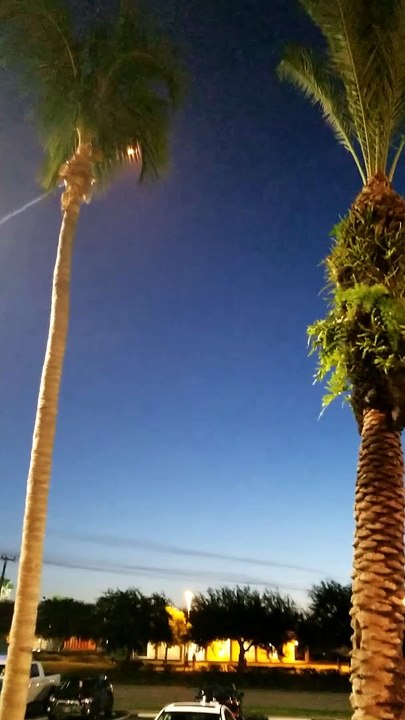 Rocket Rising into Night Sky