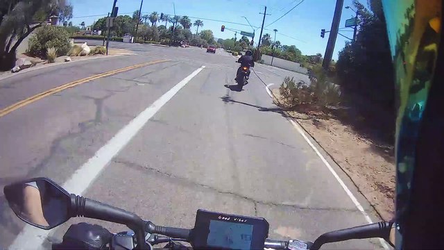 Biker Busts Through Wall