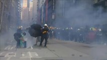 Police in Hong Kong fire tear gas as street protests continue