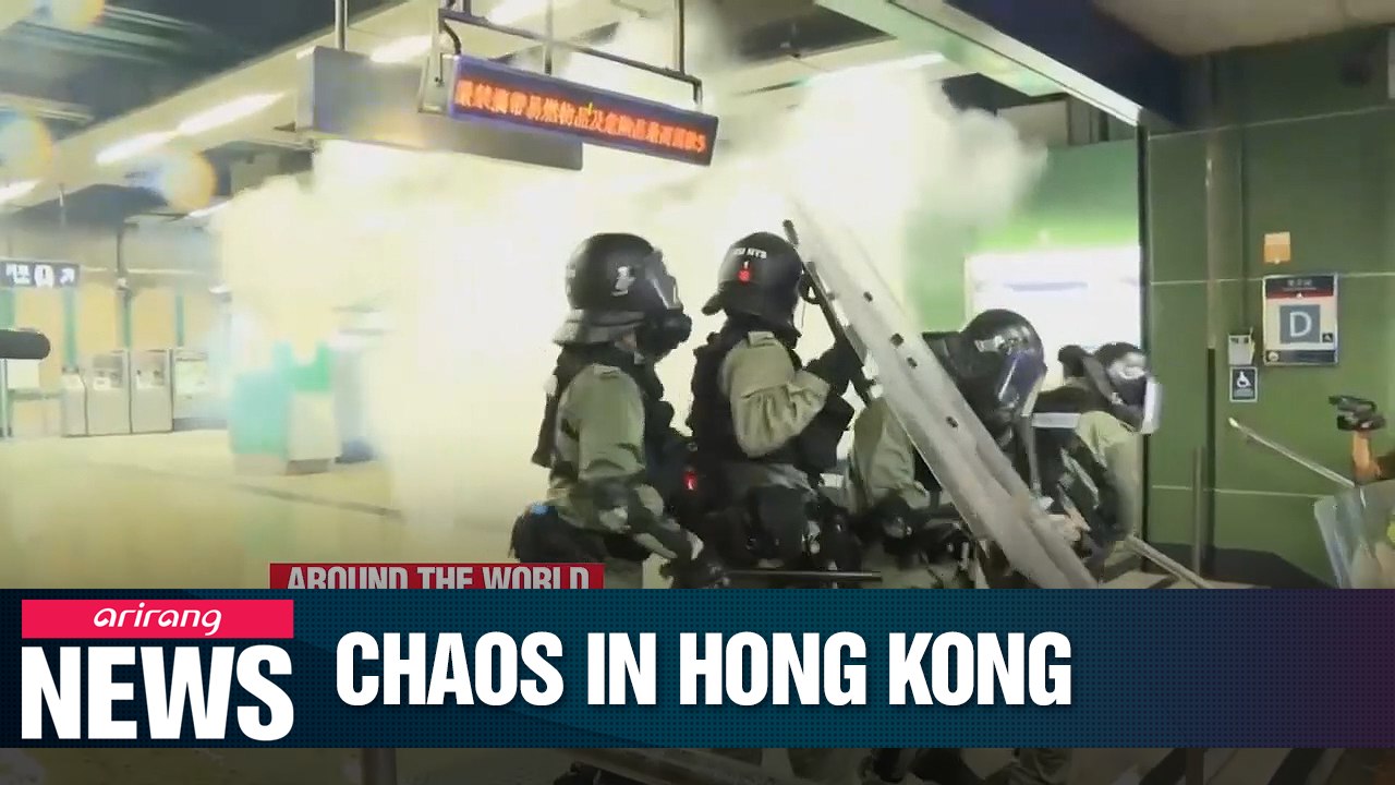 Hong Kong protesters clash with police in gueri...