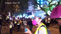 Hong Kong protesters defy police with 'hit-and-run' rallies