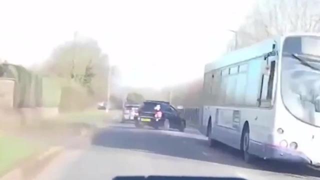 SWNS - This is the shocking moment a reckless driver smashed head-on into a woman's car, leaving her with life-changing injuries