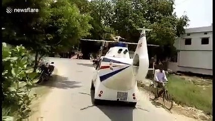 Il transforme sa voiture en hélicoptère.. qui roule !