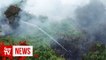 Firefighters battling forest fires in Sarawak, haze worsens