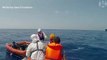 Mediterranean migrant crisis: search & rescue boat plucks migrants from sea