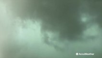 Funnel cloud concealed by heavy rainfall