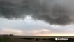 Ominous funnel cloud looms overhead in tornado-warned storm