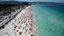 İZMİR Tatilciler Ilıca Plajı'na akın etti