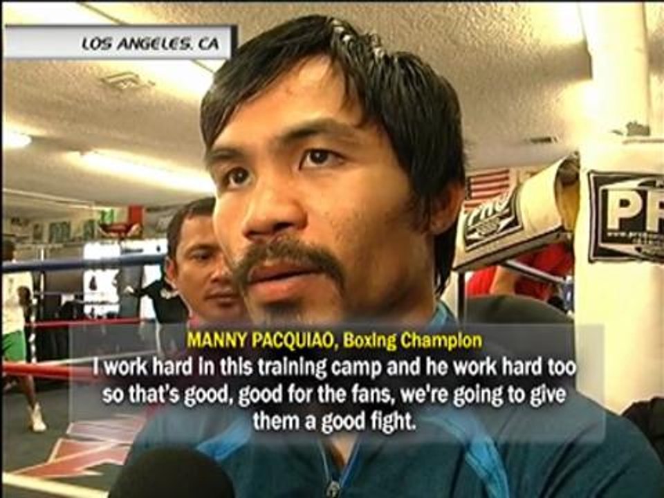 Pacquiao look-alike meets boxing superstar